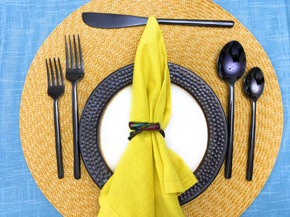 Vibhsa Black Flatware Set 20-Piece stainless steel dining utensils on a black textured plate on Tampa Home & Garden Store