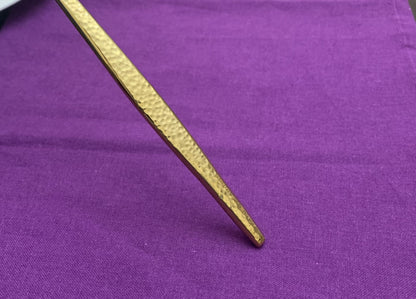 Vibhsa hammered gold flatware handle close-up, part of a 20-piece service for 4 on Tampa Home & Garden Store