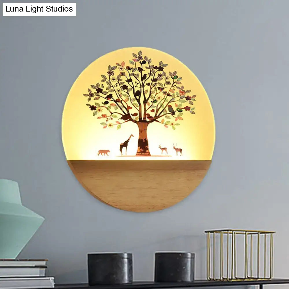 Modern Wood Wall Light by Decorbites, round wooden wall lamp with tree silhouette and warm glow on Tampa Home & Garden Store