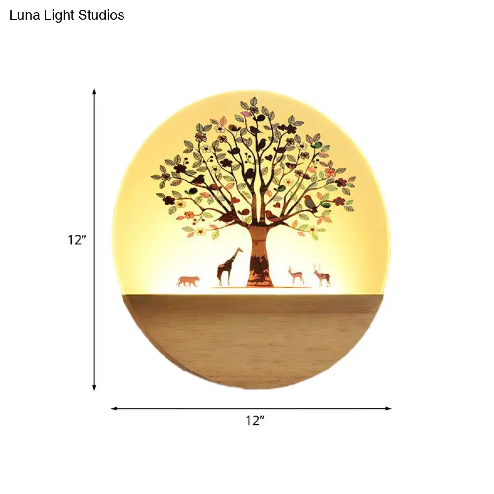 Modern Wood Wall Light, round 12in wall sconce with tree silhouette and warm glow on Tampa Home & Garden Store