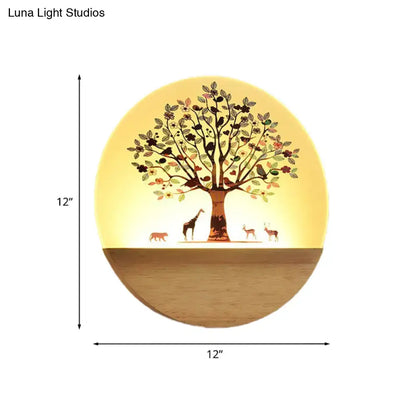 Modern Wood Wall Light, round 12in wall sconce with tree silhouette and warm glow on Tampa Home & Garden Store