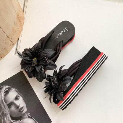 Platform slide sandals pair with black flower-embellished detailing and open toe Stevvex on Tampa Home & Garden Store