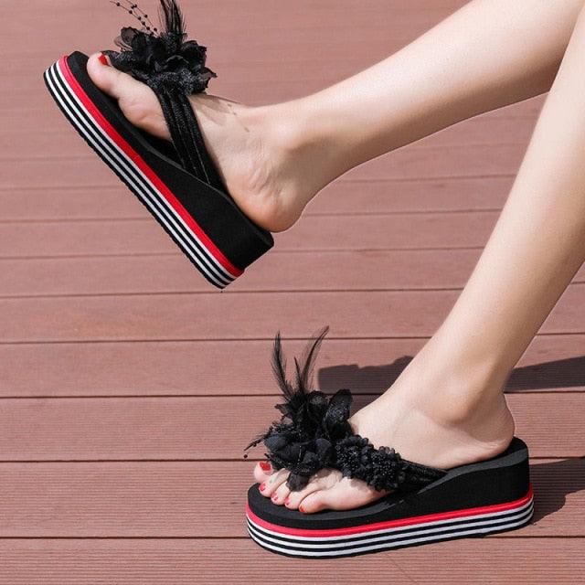 Stevvex black floral strap platform flip flops with open toe and thick striped sole on Tampa Home & Garden Store