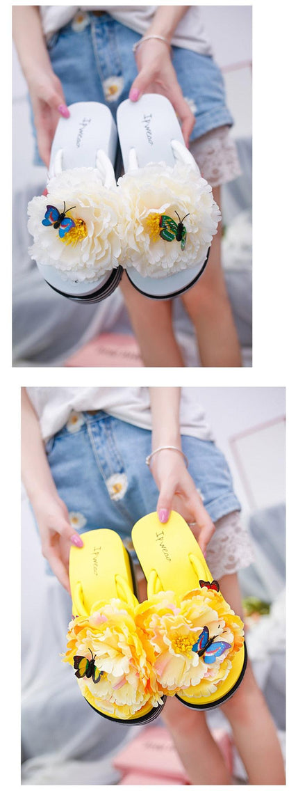 Pair of white floral petal slides by Stevvex with butterfly accents, platform slippers on Tampa Home & Garden Store
Pair of yellow floral slides by Stevvex with butterfly accents, open-toe platform slippers on Tampa Home & Garden Store