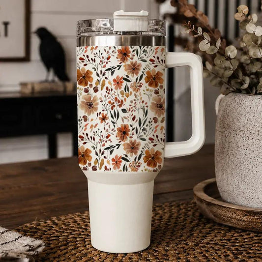 Floral Fall 40oz travel mug tumbler by Gia Roma with white handle and orange floral print on Tampa Home & Garden Store