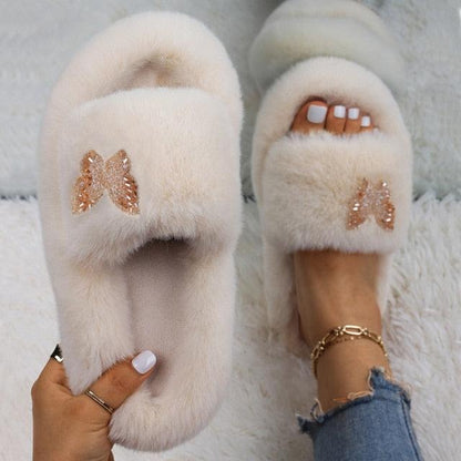 Women faux fur slippers with rhinestone butterfly embellishment, cream color, Stevvex pair on Tampa Home & Garden Store