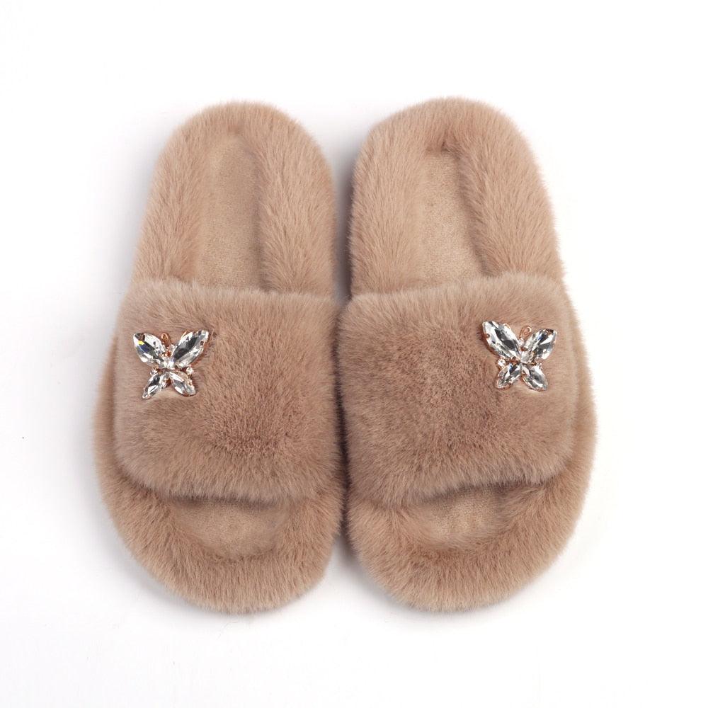 Women’s faux fur slippers with rhinestone butterfly embellishments, beige pair Stevvex on Tampa Home & Garden Store