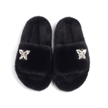 Women’s faux fur slippers with rhinestone butterfly accents, black Stevvex plush slippers on Tampa Home & Garden Store