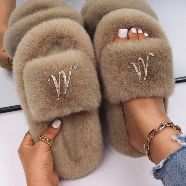 Women faux fur slippers with rhinestone butterfly detail, tan pair on Tampa Home & Garden Store