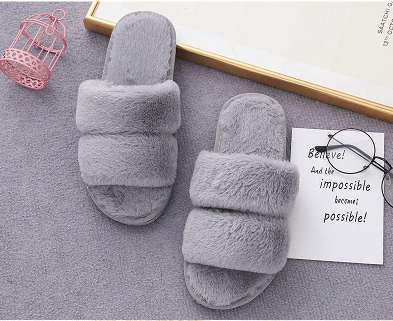 Pair of Stevvex fluffy gray faux-fur cross-slide slippers with memory foam on Tampa Home & Garden Store