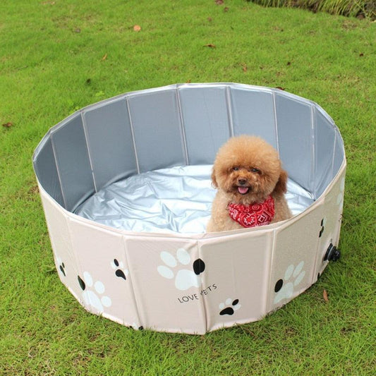 Foldable dog pool Stevvex, white paw-print exterior, blue-gray interior, portable pet pool on Tampa Home & Garden Store