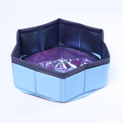 Foldable dog swimming pool by Stevvex, light blue collapsible PVC tub with dark interior walls on Tampa Home & Garden Store