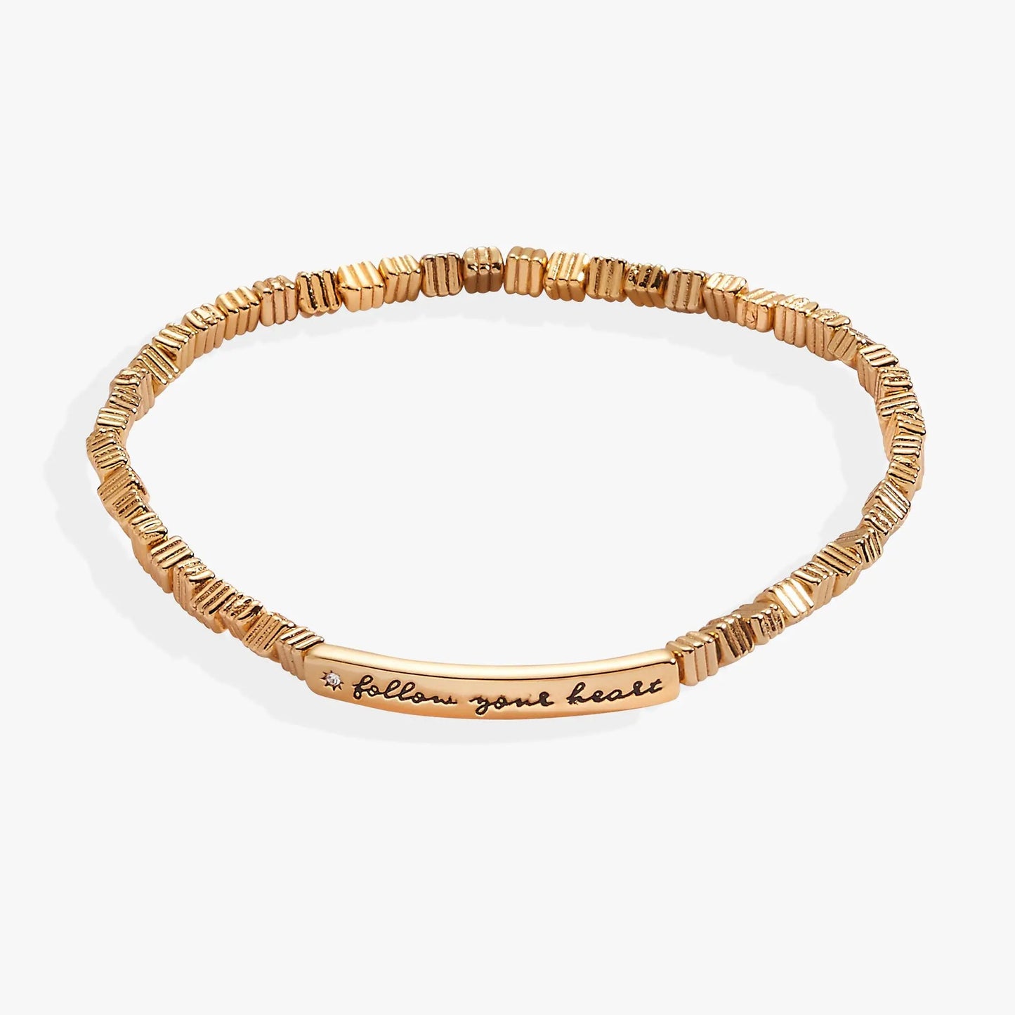 Gold-tone Alex and Ani Follow Your Heart stretch bracelet with engraved script plate on Tampa Home & Garden Store