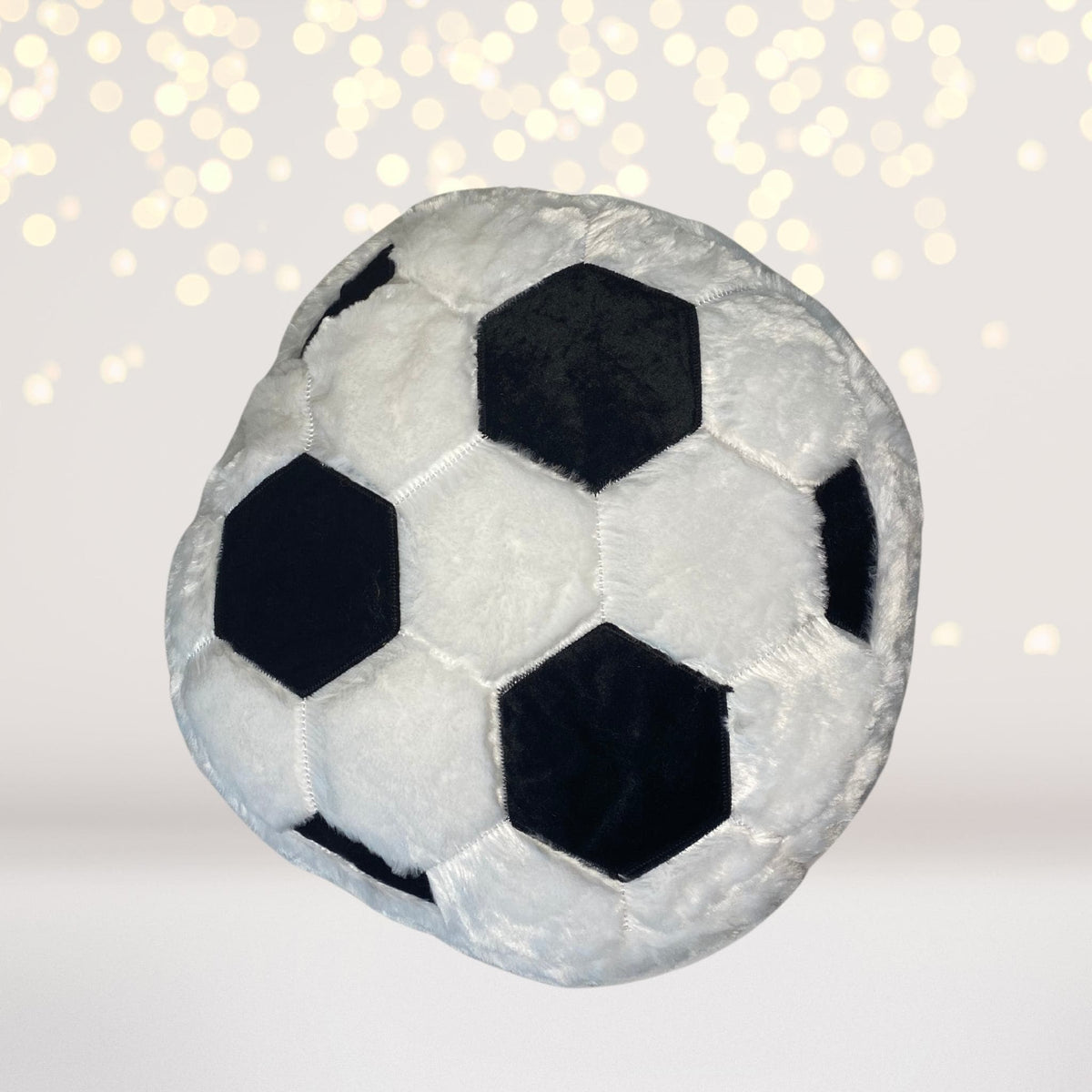 Soccer ball plush toy; gray fabric with black pentagons on Tampa Home & Garden Store