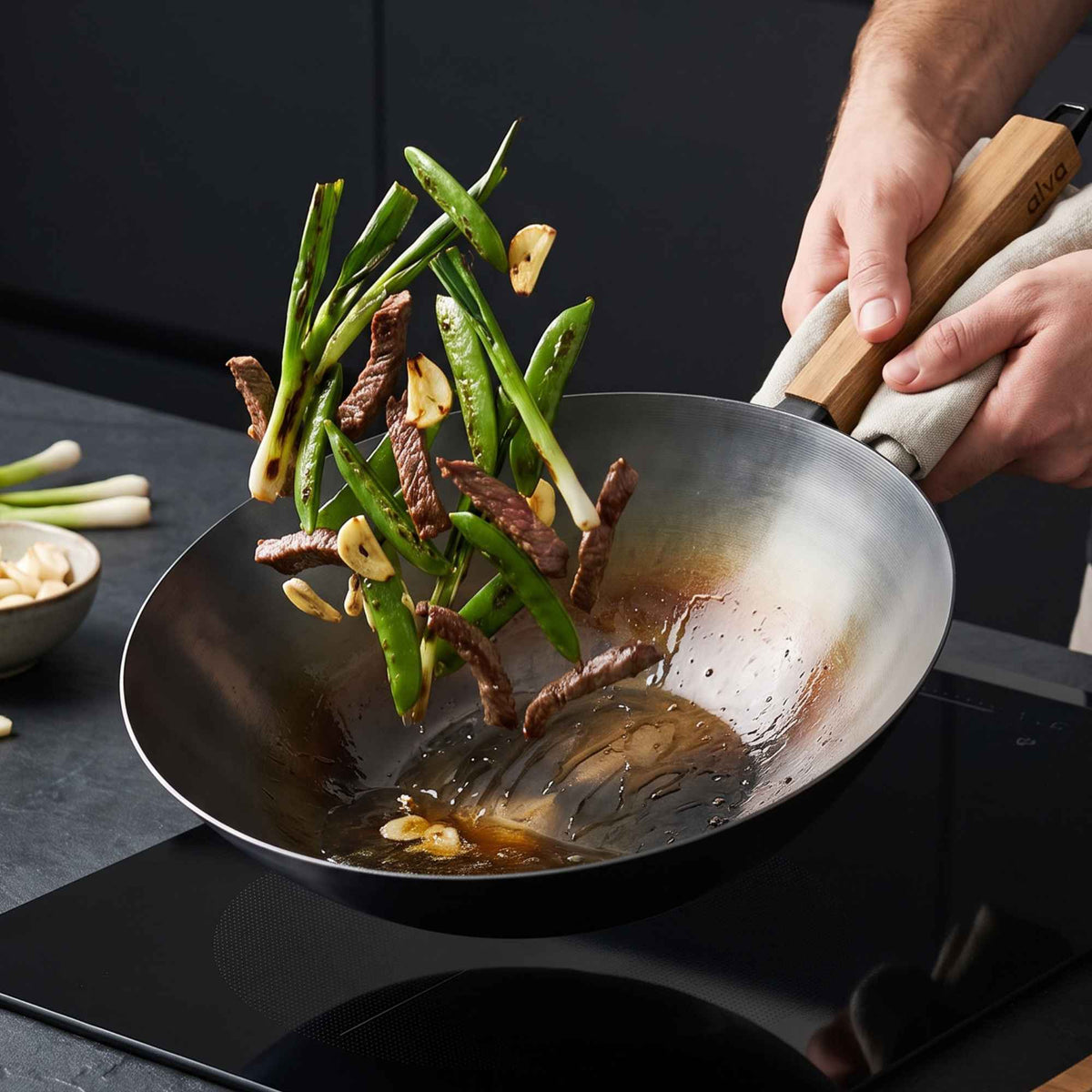 Alva Cookware carbon steel wok 12in with wooden handle; beef and asparagus stir-fry on Tampa Home & Garden Store