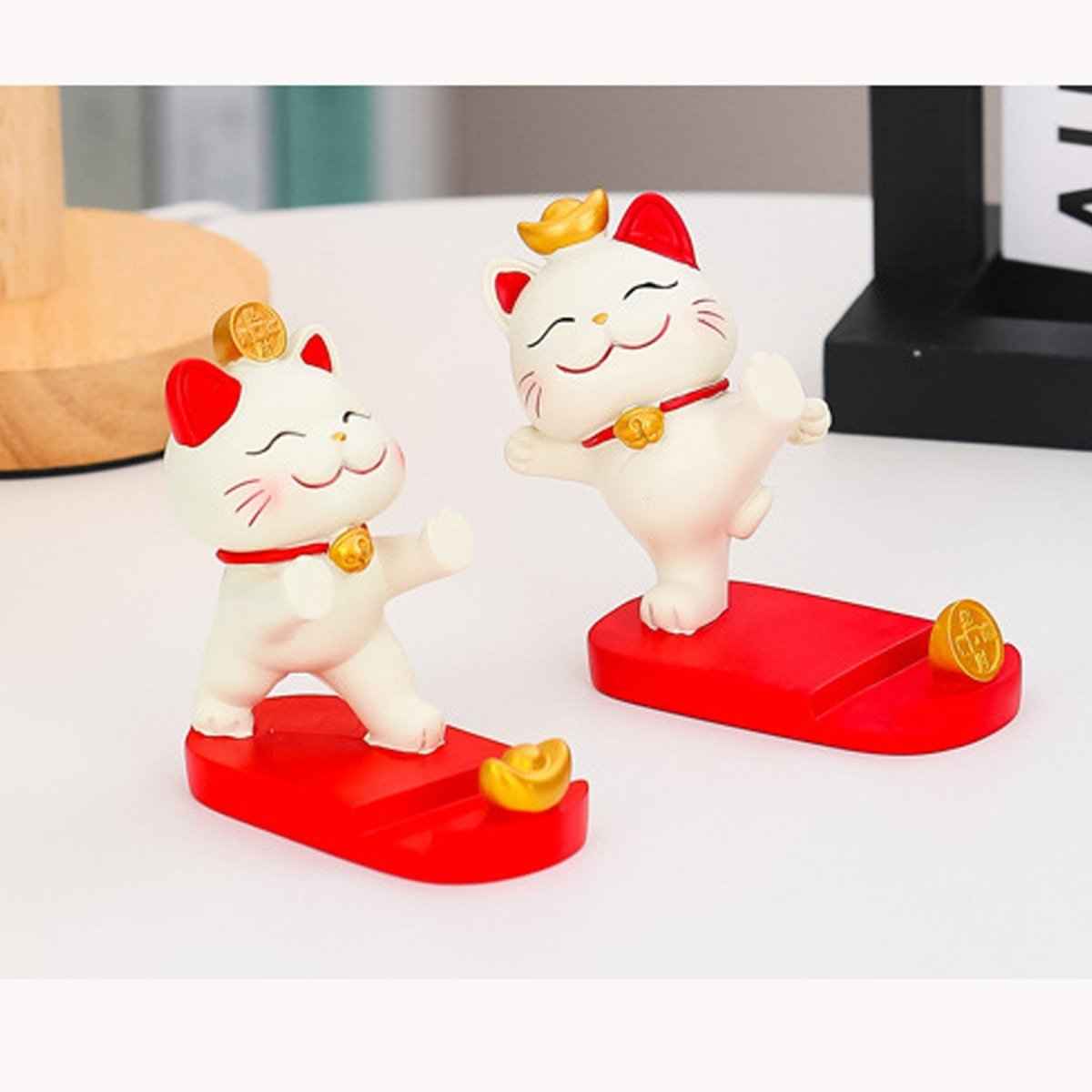 Fortune Cat Phone Stand: 2 Maneki Neko figures with red ears on red bases, gold coins Shaketea on Tampa Home & Garden Store