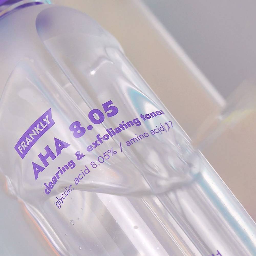 Toner FRANKLY AHA 8.05% clear container with purple text reading clearing & exfoliating toner on Tampa Home & Garden Store