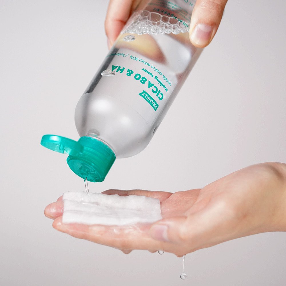 FRANKLY CICA 80 & Hyaluronic Acid Toner bottle by Seoulia with teal cap dispenses onto cotton pad on Tampa Home & Garden Store