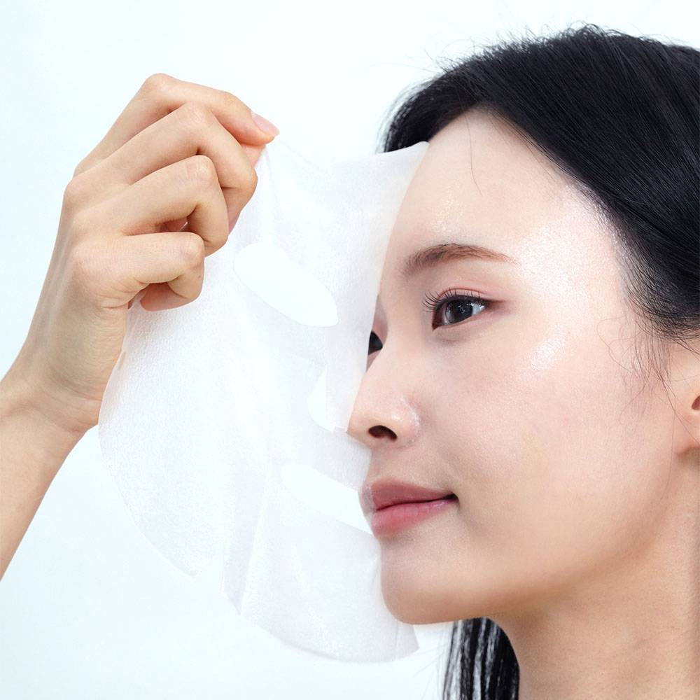 FRANKLY Closer Pore Minimizing Mask Pack sheet mask by Seoulia, white facial mask in use on Tampa Home & Garden Store