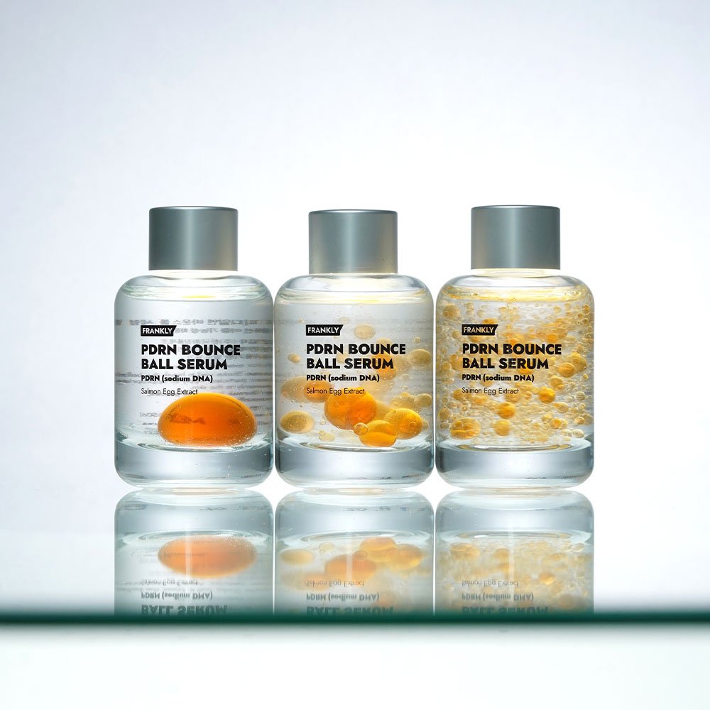 FRANKLY PDRN Bounce Ball Serum trio in glass bottles with grey caps and orange spheres on Tampa Home & Garden Store