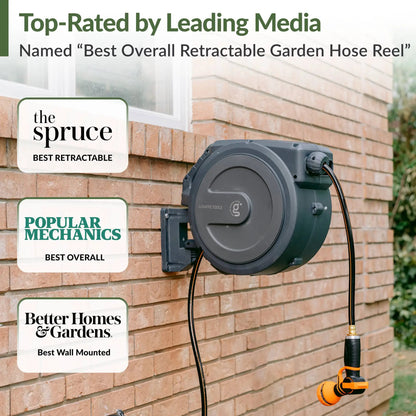 Retractable Garden Hose Reel by Giraffe Tools, black housing with orange hose, wall mounted on Tampa Home & Garden Store