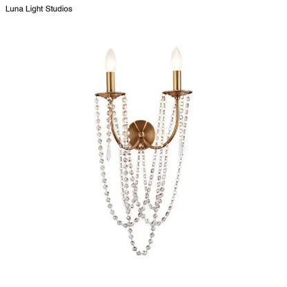 French country brushed brass crystal wall sconce with twin candle bulbs and crystals Decorbites on Tampa Home & Garden Store