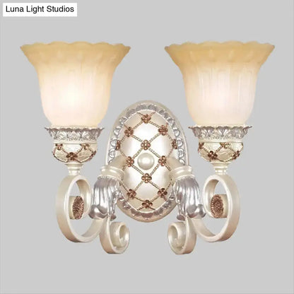 Gold Opaline Wall Sconce with dual frosted shades and scrolling metalwork by Decorbites on Tampa Home & Garden Store