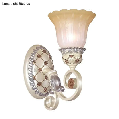 Gold opaline wall sconce with scalloped glass shade and ornate ivory metalwork by Decorbites on Tampa Home & Garden Store