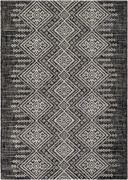 Frankville Black & White Outdoor Rug with a geometric diamond pattern for all-over accent on Tampa Home & Garden Store