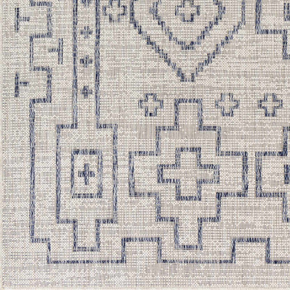 Fernway Indoor & Outdoor Rug by Boutique Rugs, blue geometric border on light beige background on Tampa Home & Garden Store