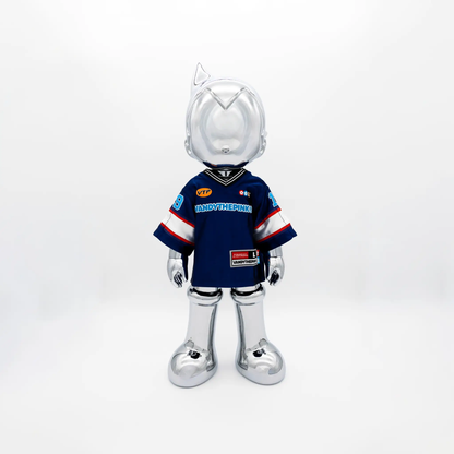 Astro Boy Reimagined action figure with silver cat-ear helmet and blue VANDYTHEPINK jersey on Tampa Home & Garden Store