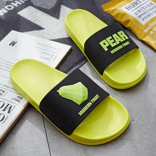 Stevvex Women Fruit Slides lime green non-slip sandals with black straps and pear graphic on Tampa Home & Garden Store