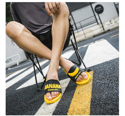 Women Fruit Slides elastic non-slip sandals in black with yellow sole and banana logo Stevvex on Tampa Home & Garden Store