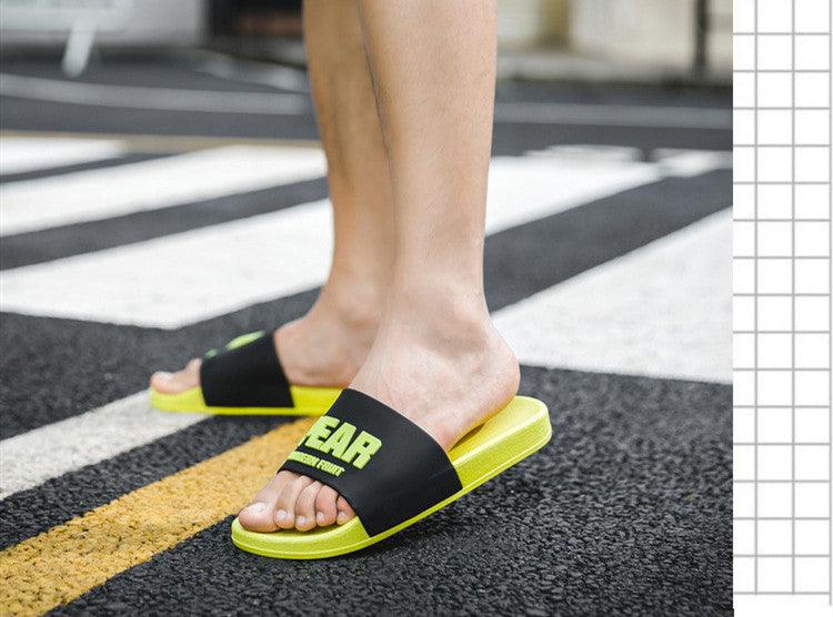 Women fruit slides by Stevvex with neon yellow sole and black elastic strap on Tampa Home & Garden Store