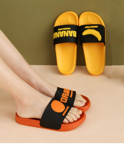 Women fruit slides Stevvex non-slip sandals with black strap orange sole two pairs visible on Tampa Home & Garden Store