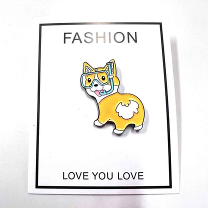 Fun Corgi Enamel Pin Diving Goggles by Shaketea, yellow corgi with blue snorkel on card on Tampa Home & Garden Store
