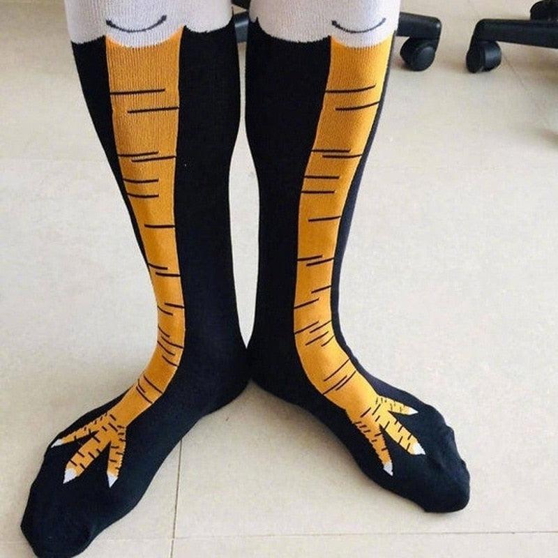 Stevvex funny chicken-leg knee socks pair in black with orange print, unisex over-the-knee on Tampa Home & Garden Store
