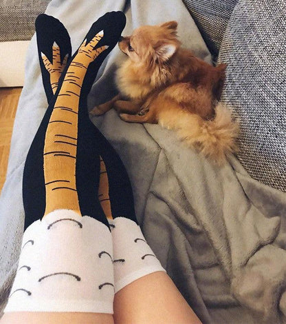 Funny chicken leg knee socks in black with orange-yellow legs and white cuff clouds, unisex on Tampa Home & Garden Store