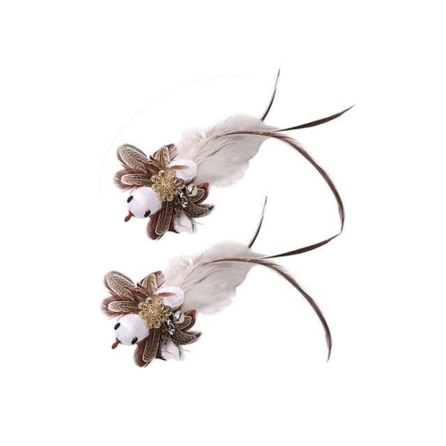 Feathered bird cat teaser wand toy pair with plush white heads and brown wing accents on Tampa Home & Garden Store