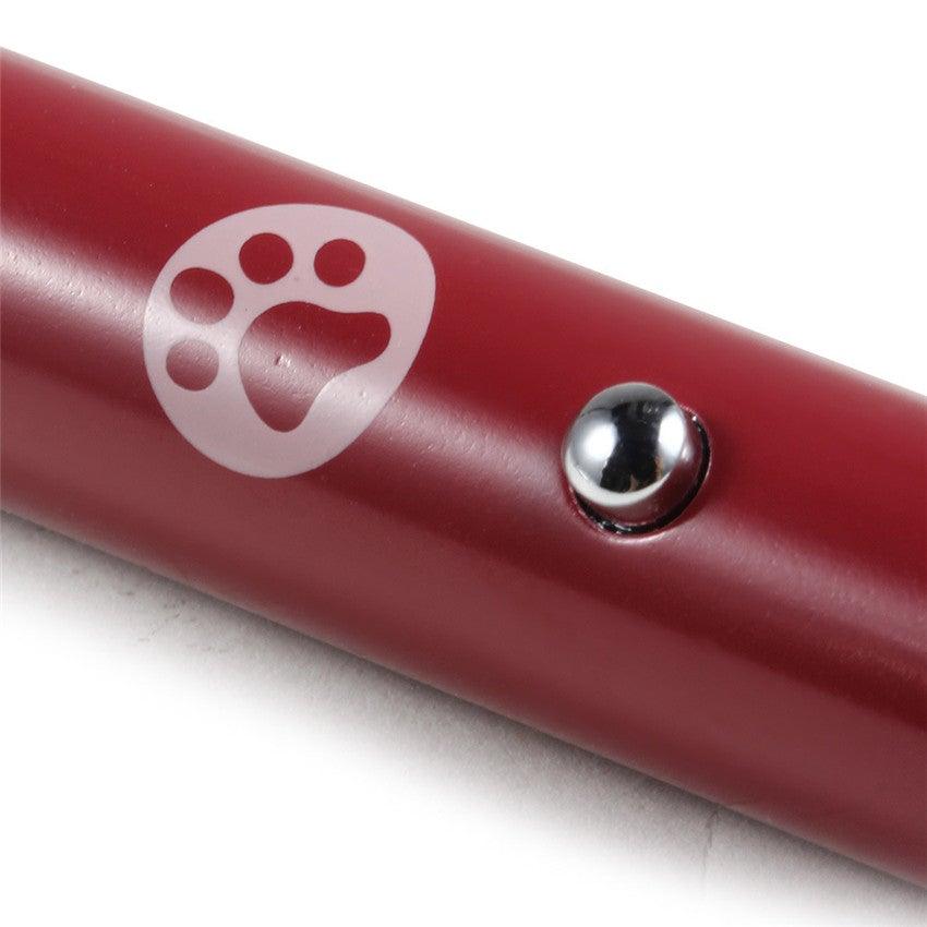 Stevvex LED laser toy pen for cats, red metal body with paw logo and button on Tampa Home & Garden Store