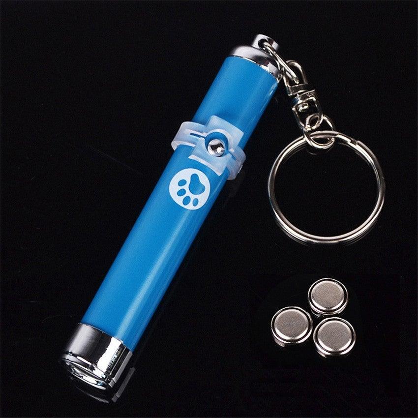 Stevvex blue LED laser pointer pet toy with paw logo, keychain, and 3 coin batteries on Tampa Home & Garden Store