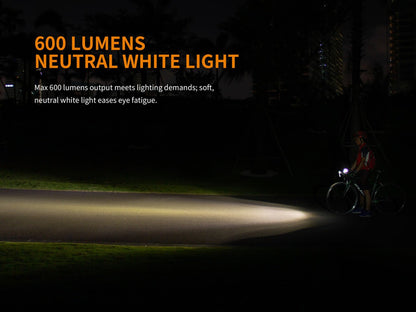 Fenix BC25R LED Bike Light mounted on a cyclist at night; bright beam lights the road on Tampa Home & Garden Store