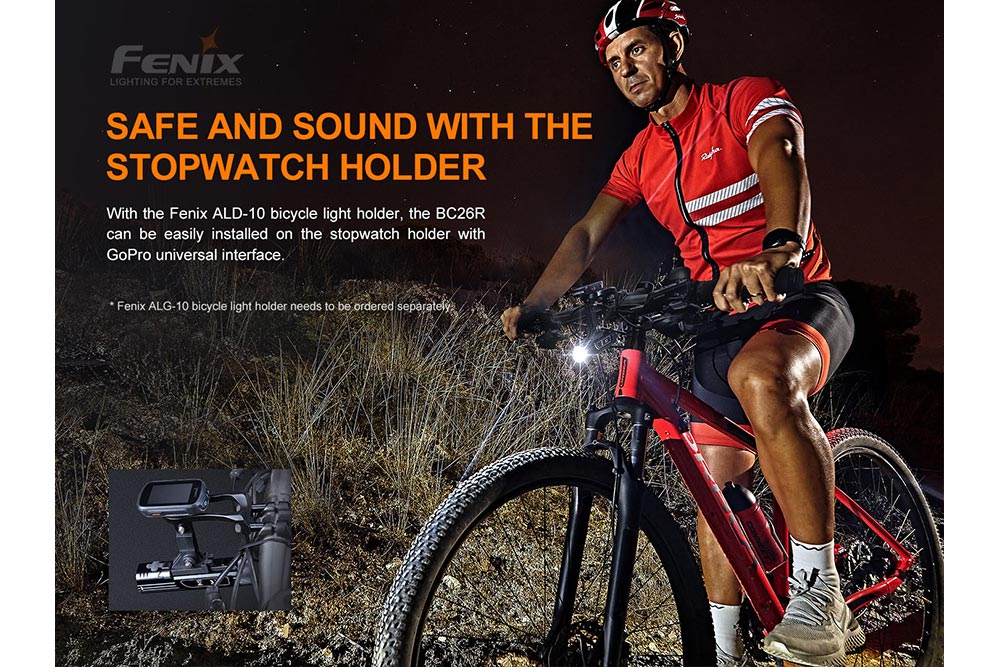Fenix BC26R LED bike light mounted on red mountain bike with rider in red jersey; inset closeup on Tampa Home & Garden Store