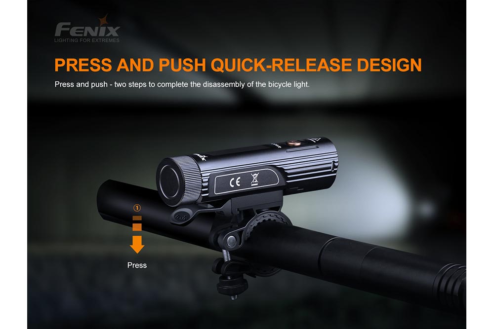 Fenix BC26R LED Bike Light mounted on a handlebar with quick-release clamp, black compact flashlight on Tampa Home & Garden Store