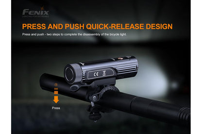 Fenix BC26R LED Bike Light mounted on a handlebar with quick-release clamp, black compact flashlight on Tampa Home & Garden Store