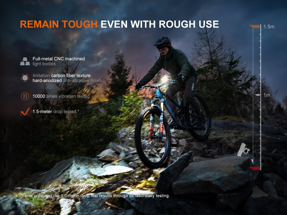 Bike light pair: Fenix BC28R smart head & tail lights on a rugged blue mountain bike on Tampa Home & Garden Store