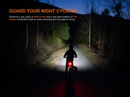 Fenix BC28R smart bike light combo, rider on a night road with front beam and rear red light on Tampa Home & Garden Store
