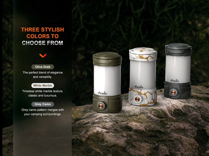 Fenix CL26R PRO lanterns, 3-pack in olive drab, white marble, and grey camo on rocky ground on Tampa Home & Garden Store