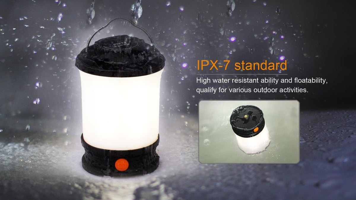 Fenix CL30R LED camping lantern with black top, white glow, orange power button Fenix Store on Tampa Home & Garden Store