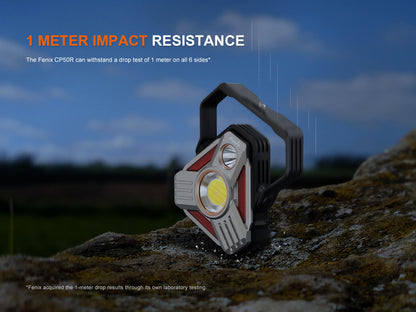 Fenix CP50R lantern with black handle and gray-red body on terrain, Fenix Store, on Tampa Home & Garden Store